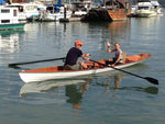 Passenger waving during a row on Richardson Bay, California, in an Annapolis Wherry Tandem built by Bob L.  Thumbnail