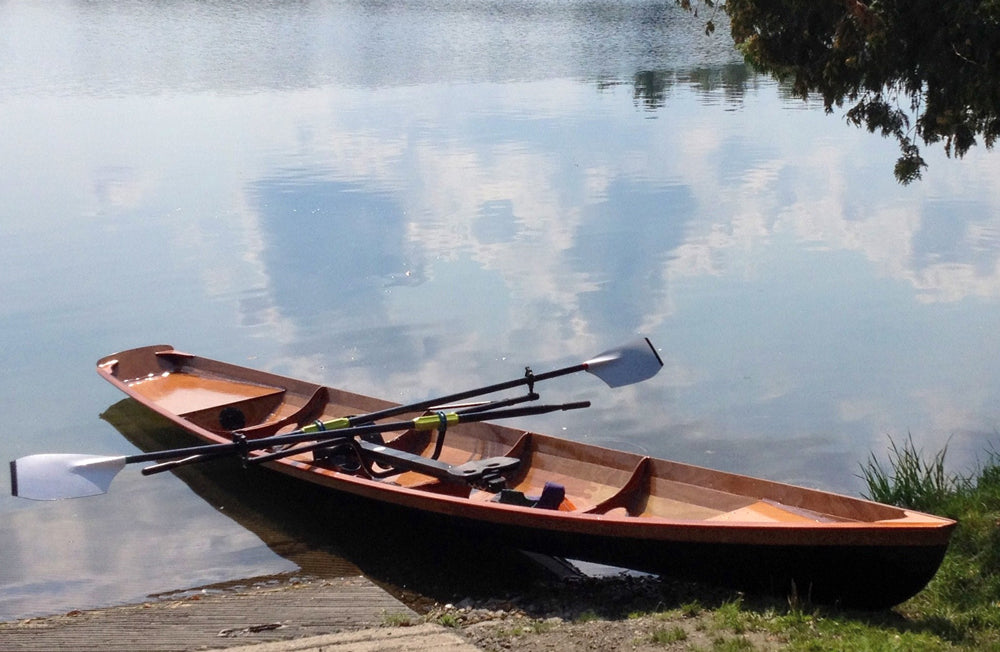 An Annapolis Wherry Tandem built by Ian H. on the shore at Derby Line, VT