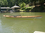 An Annapolis Wherry Tandem built by JP floating on a calm lake Thumbnail