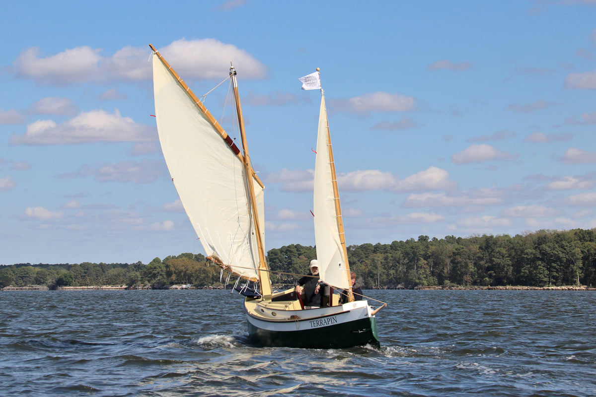 The lug-rigged Autumn Leaves canoe yawl, TERRAPIN, seen from port quarter.