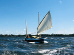 Heavily reefed Autumn Leaves canoe yawl on rough water Thumbnail