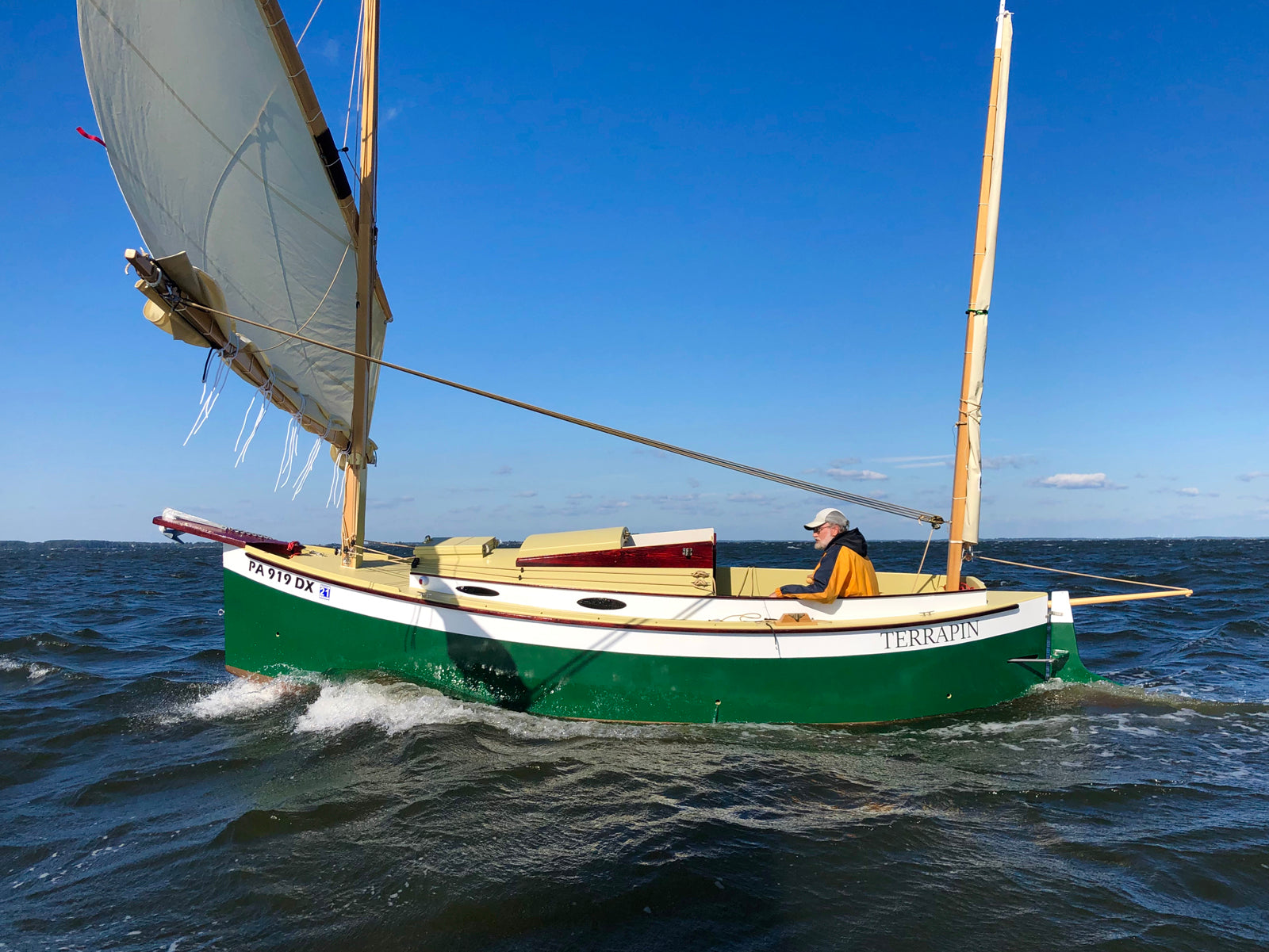 Autumn Leaves canoe yawl under sail with reefed lug rig