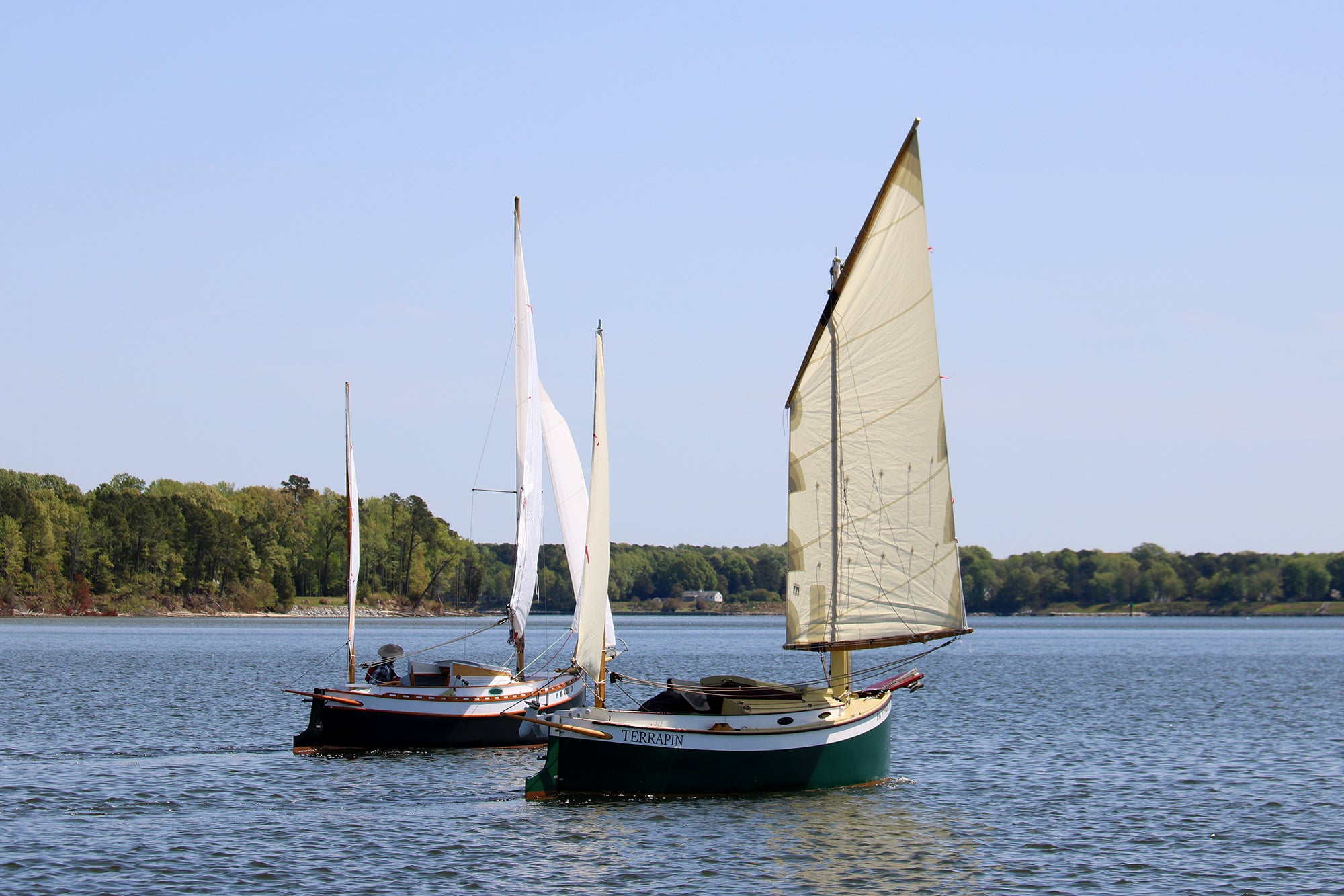 Two Autumn Leaves canoe yawls sailing side by side.