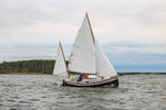 standard-rigged Autumn Leaves canoe yawl under full sail. Thumbnail