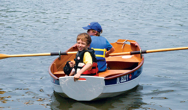 Two children enjoying a row in their Eastport Pram. Later!