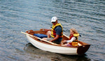 Steve A. introducing the joys of boats to an apparently delighted child. Thumbnail