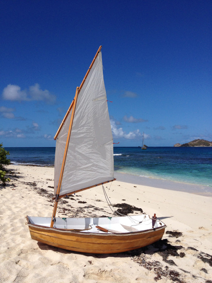 PUG is an Eastport Pram built by Mungo M. who traveled with her from the UK to the Caribbean.