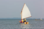 A couple enjoying a quiet sail at Okoumefest. Thumbnail