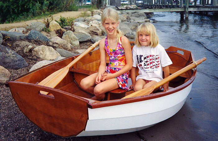 Eastport Pram on Lake Minnetonka, in Minnesota. Bill F built it. His daughters seem pretty about that.