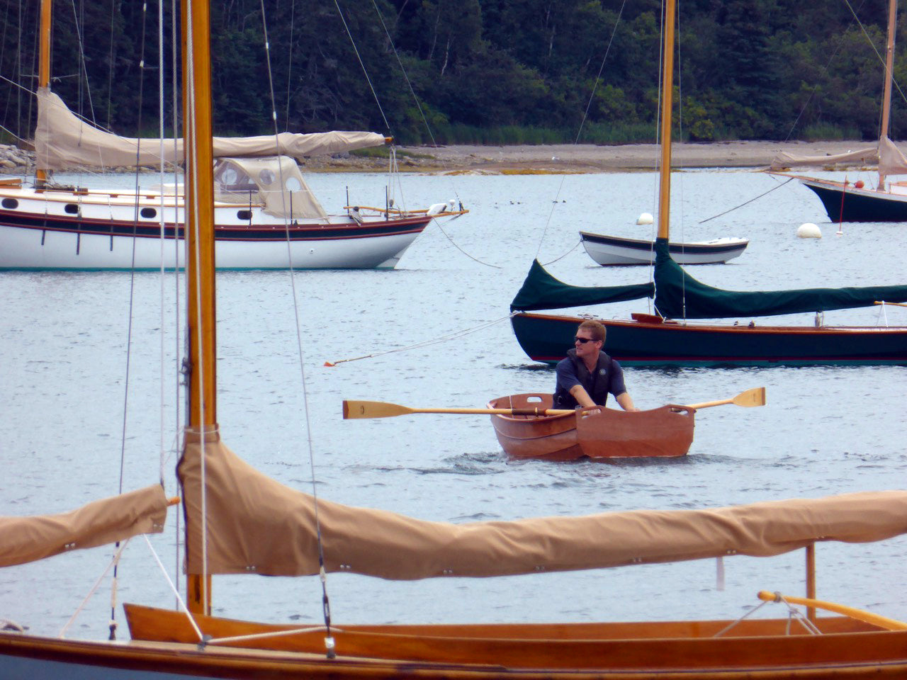 CLC's first Eastport Ultralight Dinghy negotiating a local mooring field