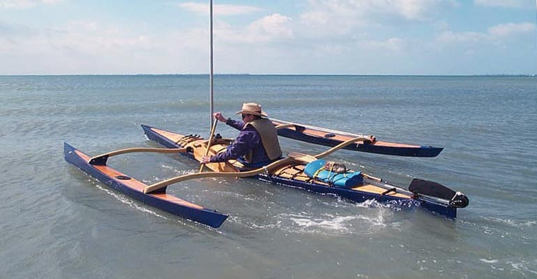 Even when the wind is calm, the  CLC SailRig adds stability to a kayak, so that one can paddle hard without fear of tipping their craft.