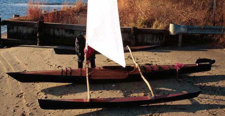 Rigging the CLC SailRig on a beach