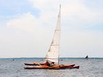 With hardly any drag, a kayak with a  CLC SailRig glides through the water. Thumbnail
