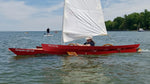 One can just see the leeboard peeking out below the windward ama as this sailor is enjoying a fast ride under a  CLC SailRig. Thumbnail