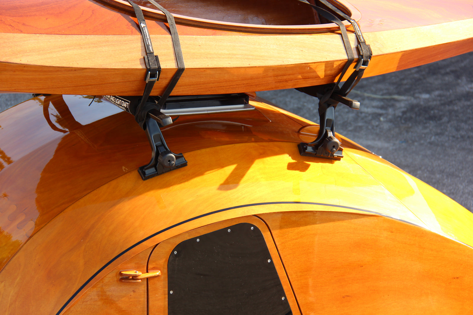 The roof rack of the CLC Teardrop Camper is specially designed to fit the curve of the roof and avoid contact with the overhead vent.