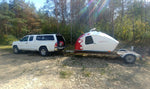 Fiery paint work on a CLC Teardrop Camper with an extended trailer. Thumbnail