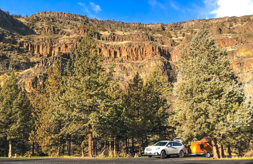 CLC Teardrop Camper nestled in the trees at the bottom of this mountainside. Photograph by Megan Dugan.