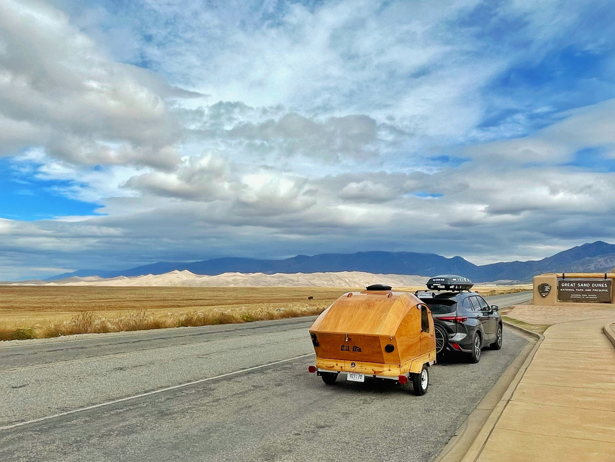 Thomas Ehrnschwender photographed hi CLC Teardrop Camper at the entrance to Great Sand Dunes National Park in Colorado.