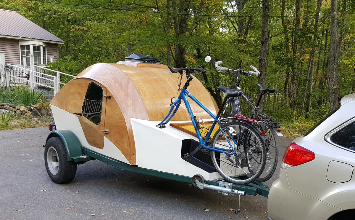 Peter Walker modified the trailer around the storage box of his CLC Teardrop Camper to hold two bicycles. 