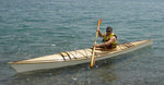 Alexandros M. paddling his Chesapeake 16 wooden kayak Thumbnail