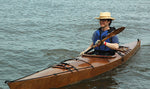 A man enjoying a paddle in a Chesapeake 16 wooden kayak at OkoumeFest 2009 Thumbnail