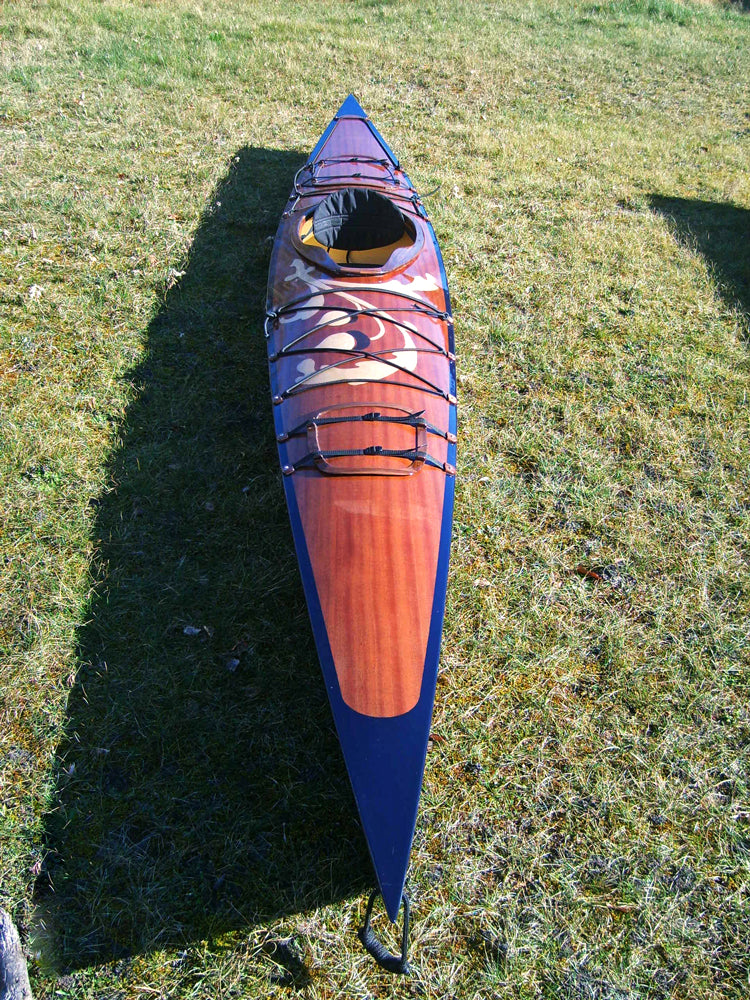 The decorated deck of a Chesapeake 16 wooden kayak built by Michal C. in Poland