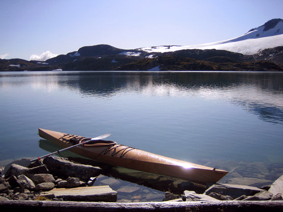 A Chesapeake 16 wooden kayak built by Sander and Kari S. at the edge of a lake 1350 meters above sea level on Sognefjellet, Norway
