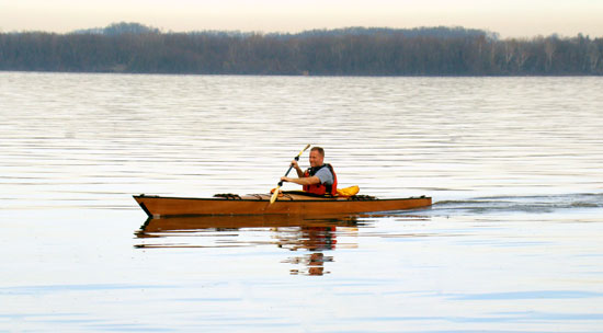 Paddling on the Susquehanna River in a Chesapeake 16 wooden kayak built by Shawn R.