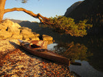 A Chesapeake 16 wooden kayak built by Peter and Minna S. on a beach in Poland Thumbnail