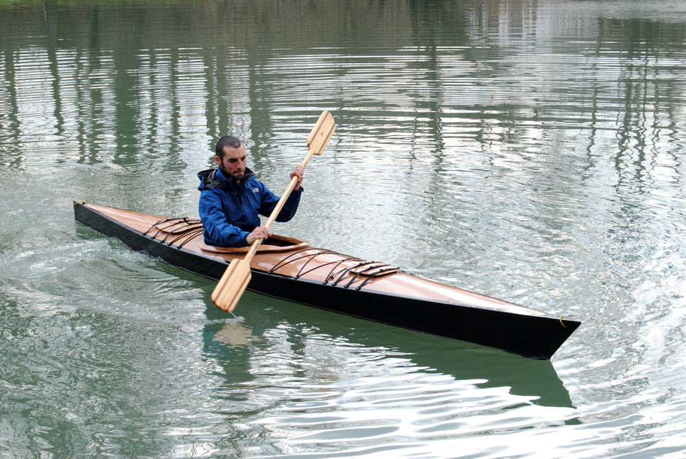 Paddling a Chesapeake 16 wooden kayak built by Adria J.M. in Spain