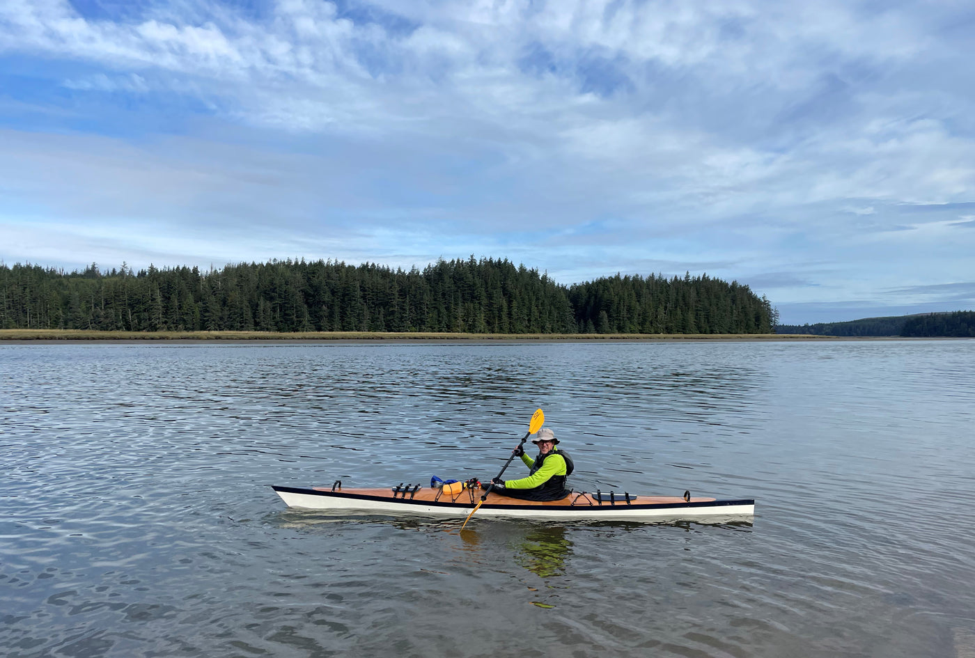 Paddling a Chesapeake 16 wooden kayak built by Michael M. at Willapa Bay Wildlife Refuge in Washington