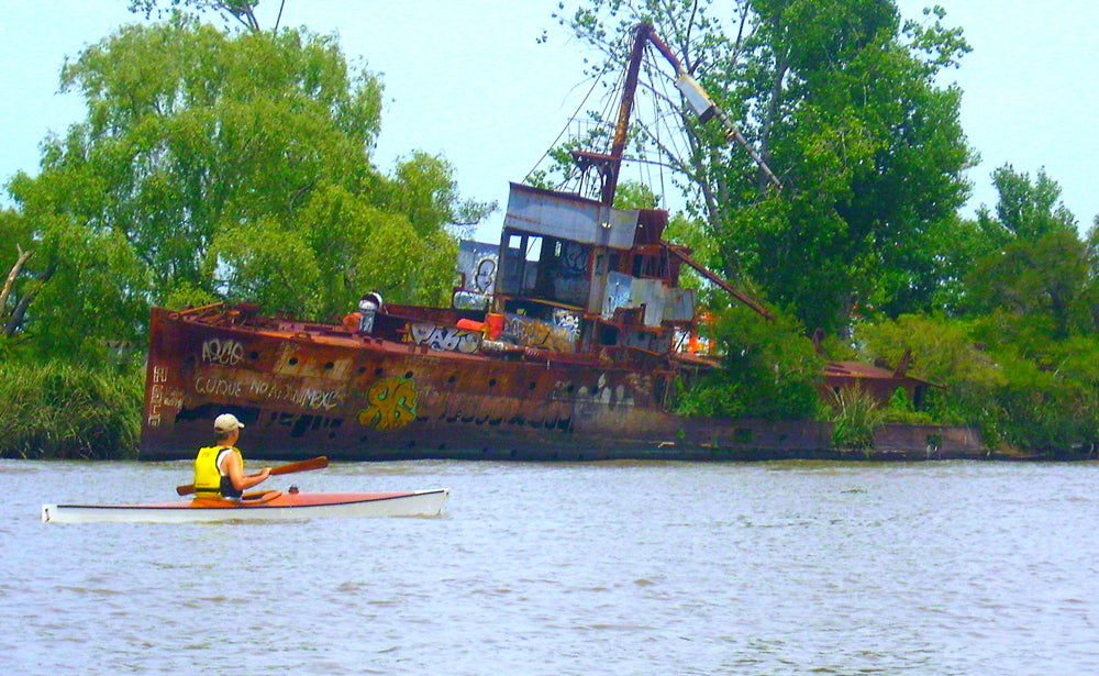 Navigating Argentina's Rio Santiago in a Chesapeake 16 wooden kayak built by Pablo S.