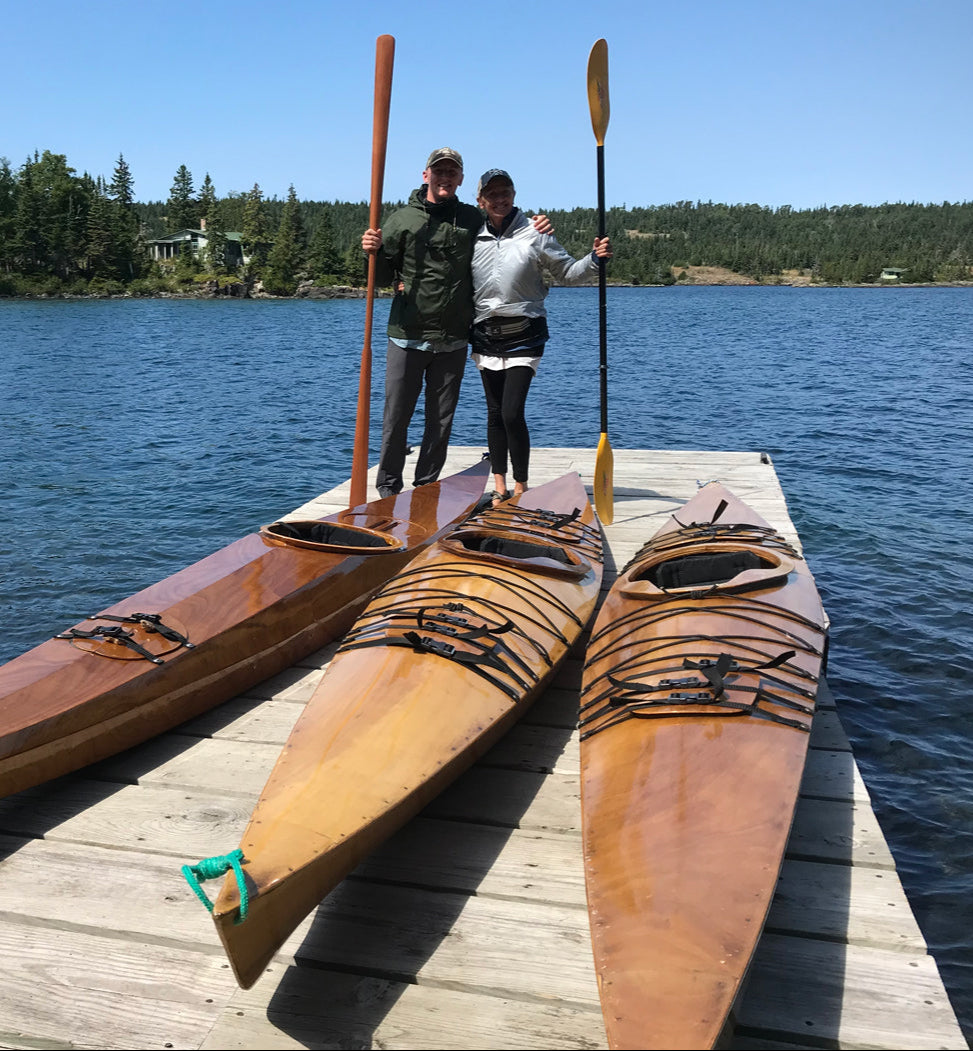 Chesapeake 16 and 16LT wooden kayaks built by James N. on a dock in Isle Royale National Park, Lake Superior