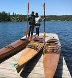 Chesapeake 16 and 16LT wooden kayaks built by James N. on a dock in Isle Royale National Park, Lake Superior Thumbnail