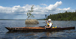Joe F. paddling his finely detailed Chesapeake 17LT wooden kayak on northern waters Thumbnail