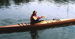  A woman paddling a Chesapeake 17LT wooden kayak Thumbnail
