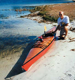 Blll K and his Chesapeake 17LT wooden kayak on a white sand beach Thumbnail