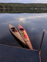 Chesapeake 16LT and 17LT wooden kayaks built by Edward B. floating on Lake Skatatuke, New Hampshire Thumbnail
