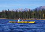 Paddling a yellow-hulled Chesapeake 17LT wooden kayak built by Dave S. on Lake Alva, Montana Thumbnail