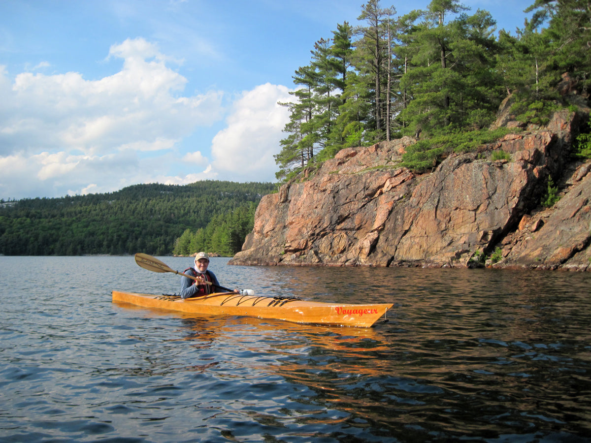 Gary I. paddling his Chesapeake 17LT wooden kayak at Killarney Provincial Park, George Lake, Canada
