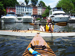  Paddling fun on an urban waterfront in a pair of Chesapeake 17LT wooden kayaks Thumbnail