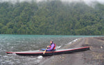 Cesar P. in his Chesapeake 17 wooden kayak at the water's edge Thumbnail