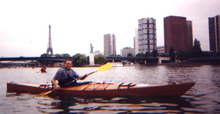 Paddling a Chesapeake 17 wooden kayak on the Seine in Paris