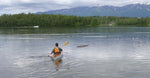 Paddling a Chesapeake 17 wooden kayak built by Ken P. on a mountain lake Thumbnail
