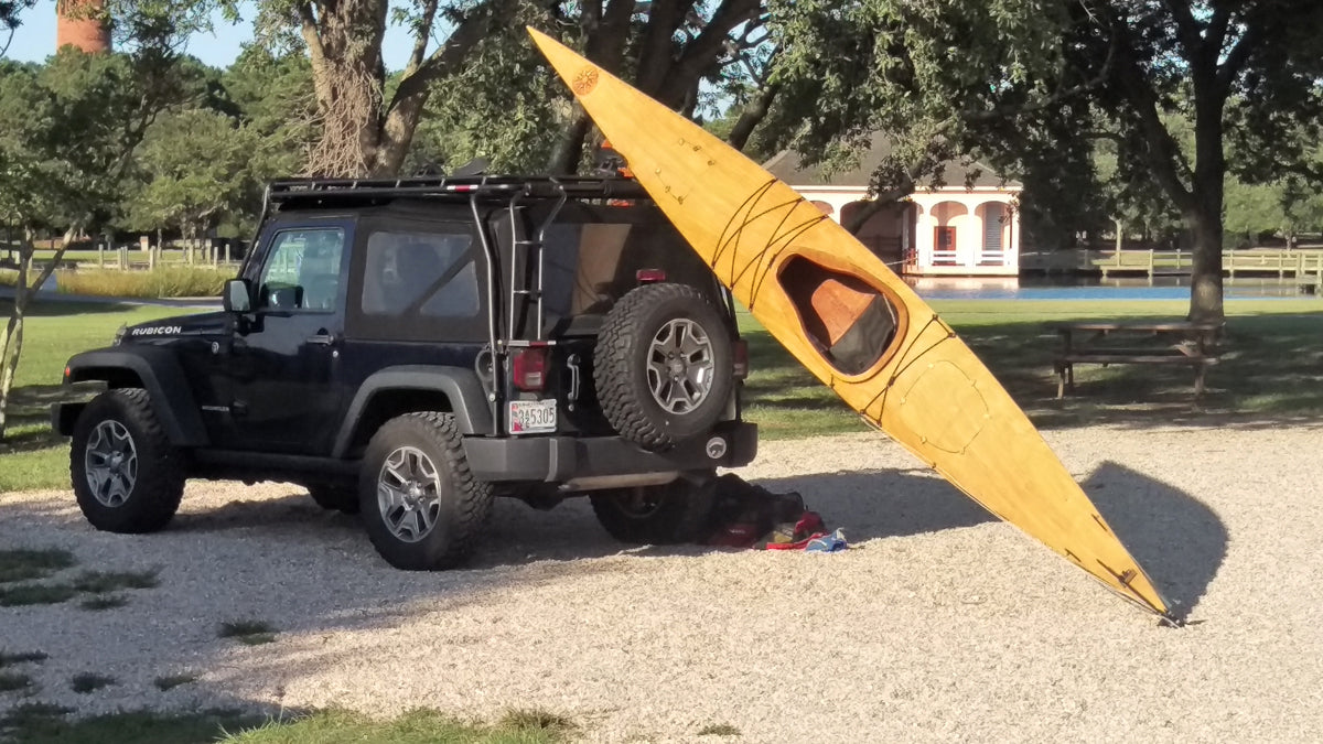 Getting ready to cartop a Chesapeake 17 wooden kayak built by Brian M.  on the Outer Banks of North Carolina