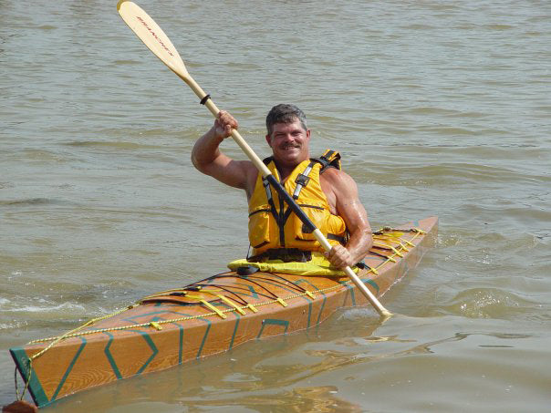 Clancy S. enjoying a paddle in his Chesapeake 17 wooden kayak