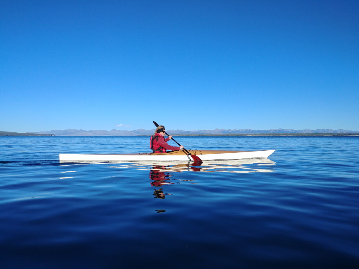 David H. paddling his Chesapeake 17 wooden kayak on Yellowstone Lake