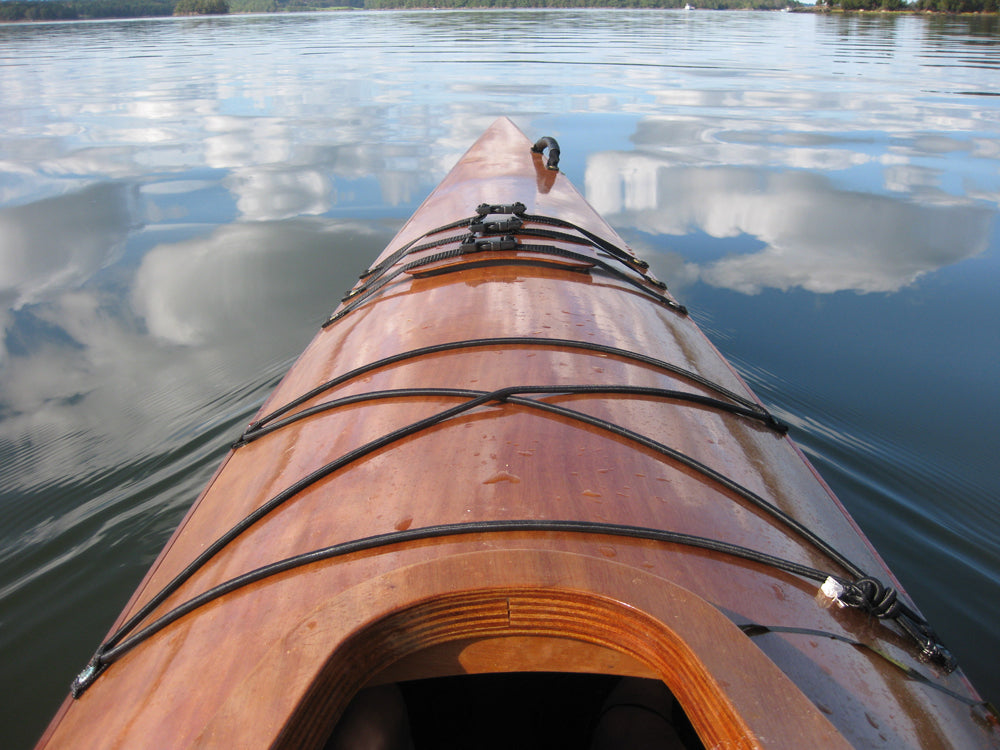 A view of the bow of a Chesapeake 17 wooden kayak built by Matthew L. near Nanny Island, Great Bay, Portsmouth, NH