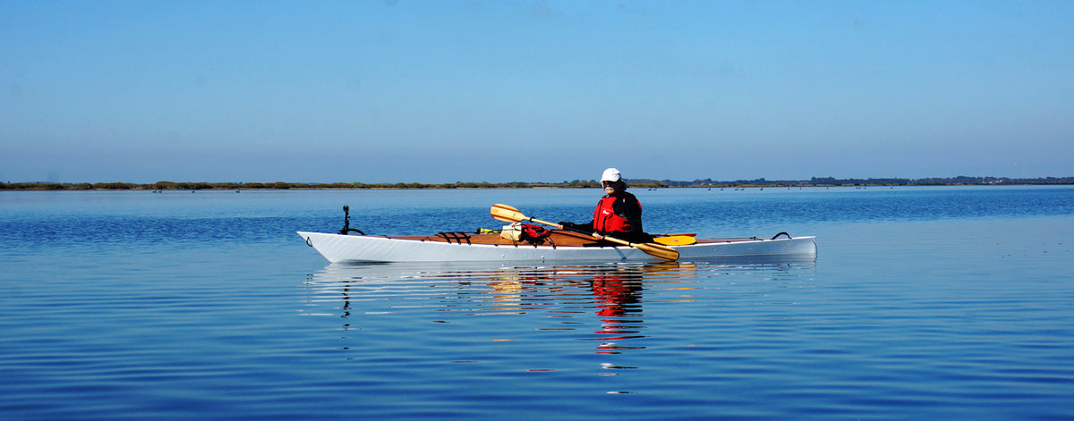 Paddling a Chesapeake 17 wooden kayak built by Tony S. on flat water in Geelong, Victoria, Australia