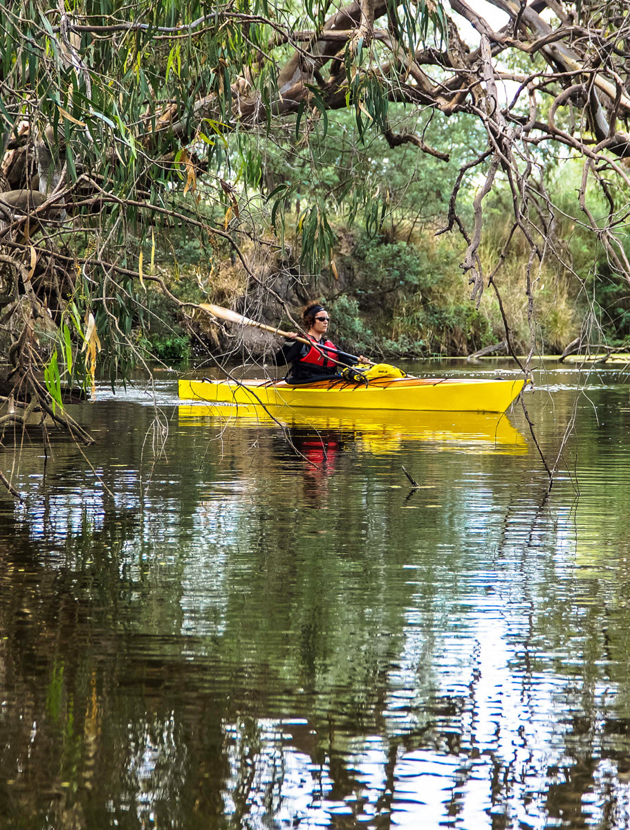 Paddling a yellow Chesapeake 17 wooden kayak built by Tony S. in Geelong, Victoria, Australia